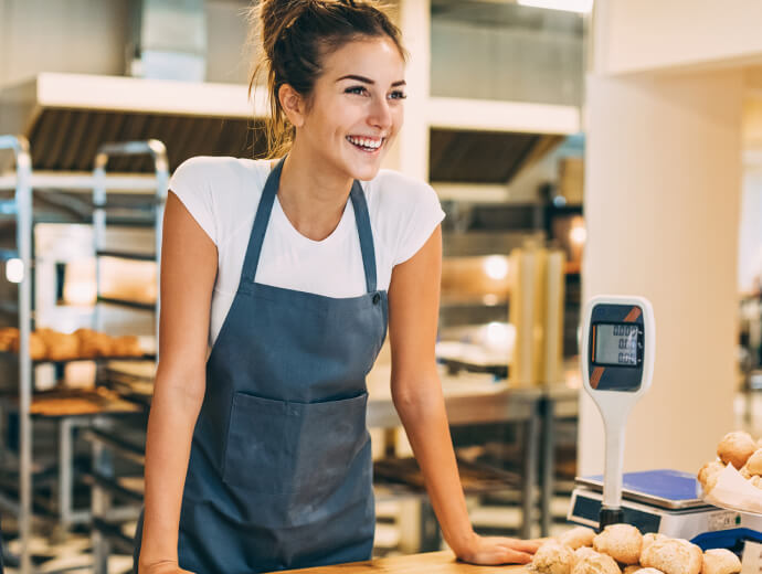 Business woman in her bakery.